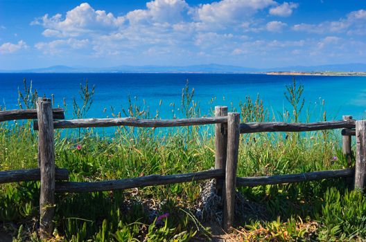 Wooden cliff fence at Aegean seaside