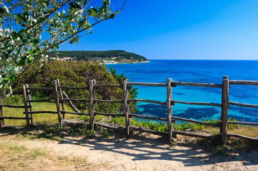 Wooden cliff fence at Aegean seaside