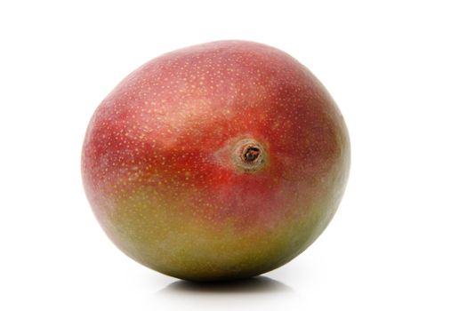whole fresh mango isolated on white
