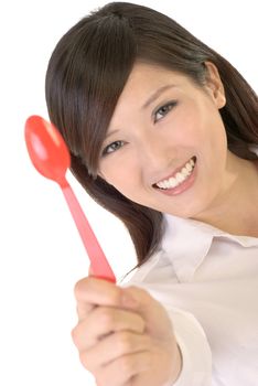 Business woman with tablespoon and smile on white background.