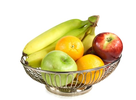 variety of fresh fruit on basket isolated on white