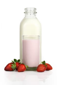 fresh milk with raw strawberries