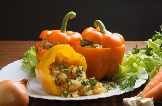 The sweet bulgarian pepper with vegetables and rice