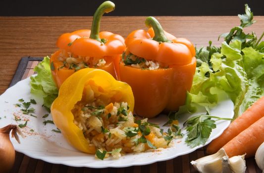 The sweet bulgarian pepper with vegetables and rice