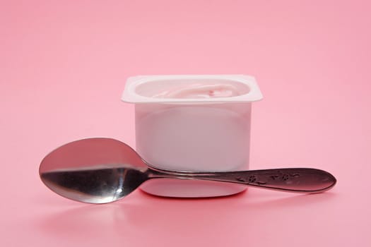 single portion of strawberry yogurt