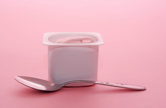 single portion of strawberry yogurt