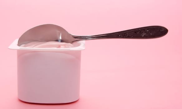 single portion of strawberry yogurt