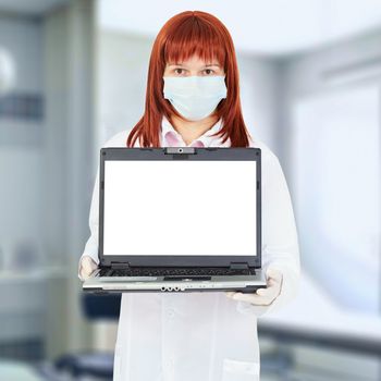 A nurse with a computer in the hospital