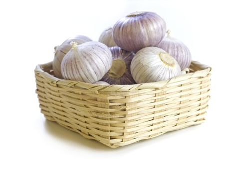 close-up of fresh purple garlic  isolated on white background