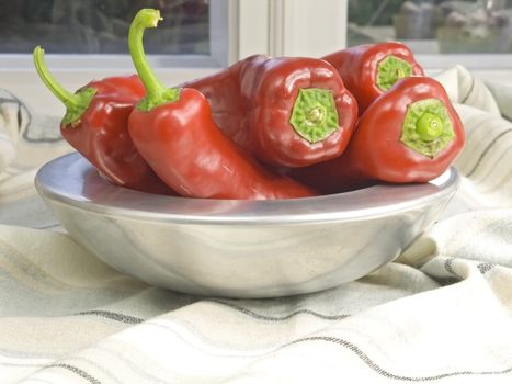 fresh and red pepper in a silver bowl