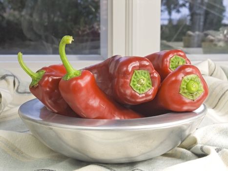 fresh and red pepper in a silver bowl