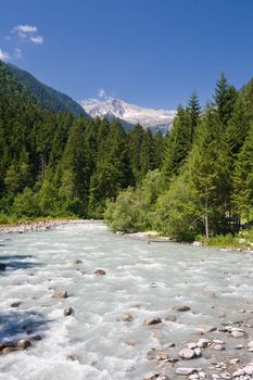 summer view of Sarca stream Trentino, Italy. Photo taken with polarized filter