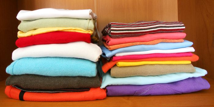 many color spring clothes in the closet