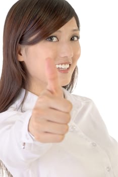 Thumb up gesture of Asian businesswoman with smile on white background.