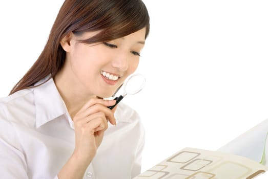 Businesswoman read report with magnifier and smile on white background.