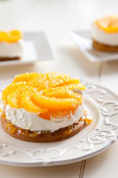 Sweet citrus dessert with oranges and cream