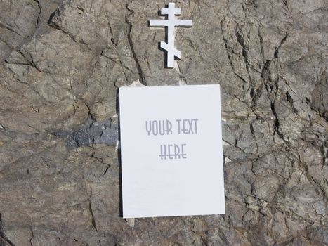 The image of a cross and a place for an inscription