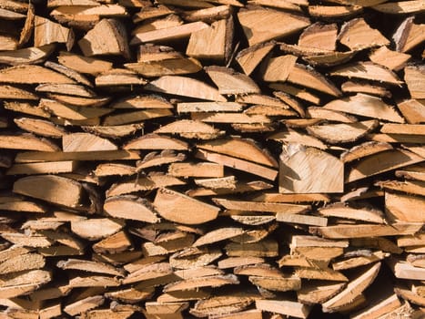 Background from boards, the image of the boards combined in a woodpile