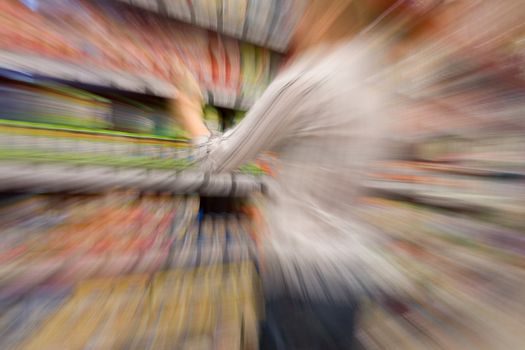 A woman shopping with zooming blur
