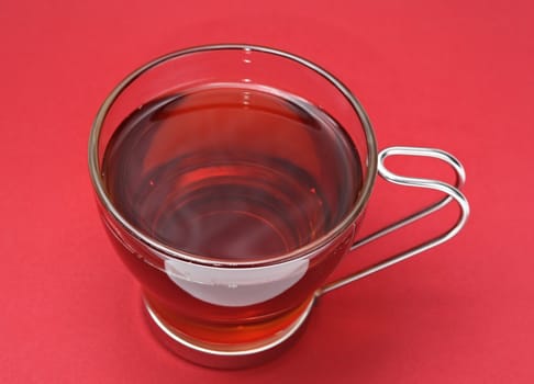 cup of tea, red background