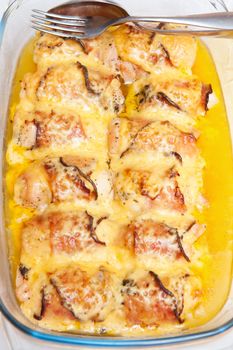 Meat rolled with ham and cheese