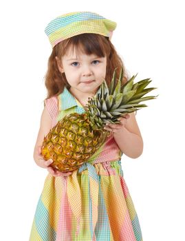 A sad little girl holding a large pineapple on white background