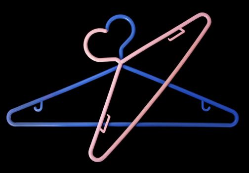 two plastic hanger, black background