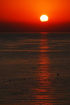 red gorgeous sunrise over Mediterranean sea in Turkey