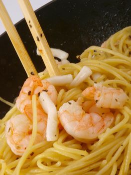 Seafood pasta. Close up in a freeing pan