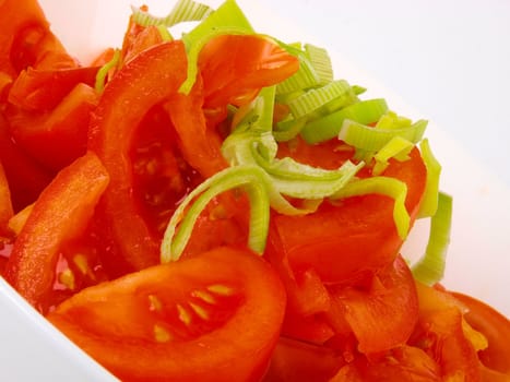 Fresh tomatoes and spring onions