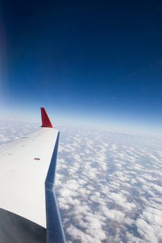 Wing detail on a plane in flight