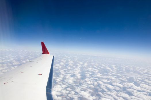 Wing detail on a plane in flight