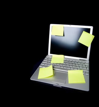 A sticky note on a laptop computer - remember this