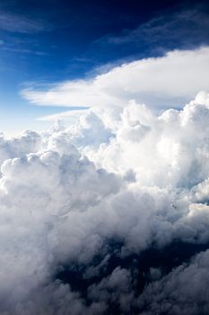 A dramatic cloudscape background with cumulus clouds