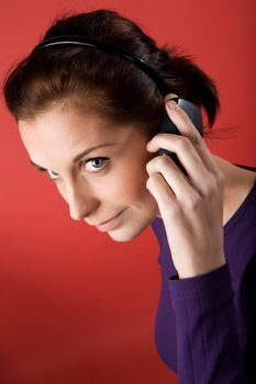 A young woman talking on the cell phone.