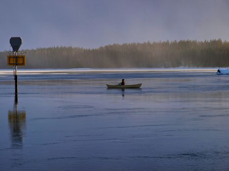 Small fishing boat on a lake