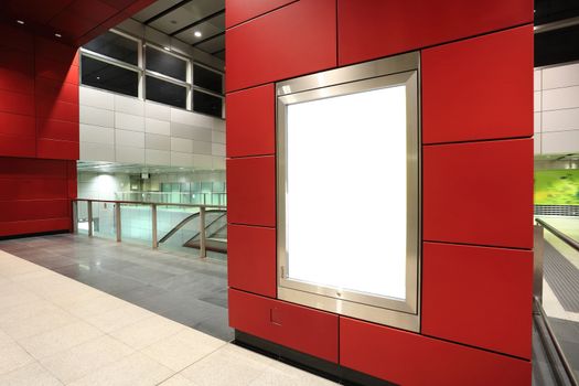 Blank billboard in metro station