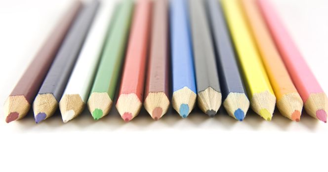 Set of coloured pencils with shadow on white background