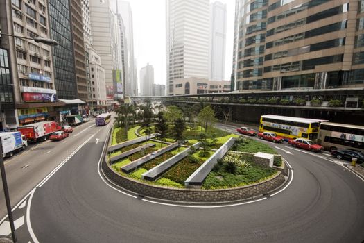 Cars passing a u turn road in hong kong