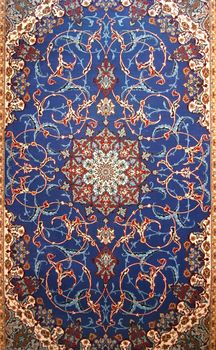 A fine textured classic persian carpet