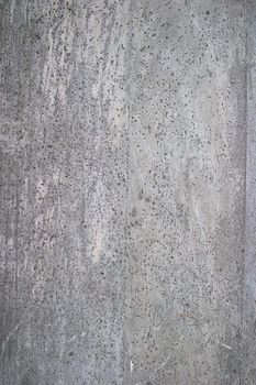 A texture image of concrete with small pits.