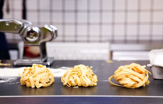 A detail of homemade fettuccine ready to be boiled