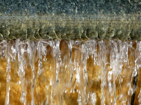 A abstract photograph of some falling water.