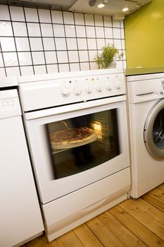 A homemade pizza baking in an oven