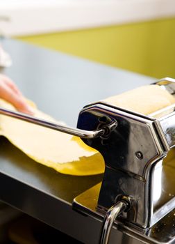A detail - abstract image of a manual pasta machine
