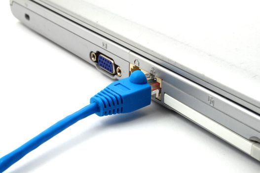 hand laptop and network connector showing lan or internet communication concept