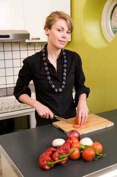 a woman cooking in the kitchen