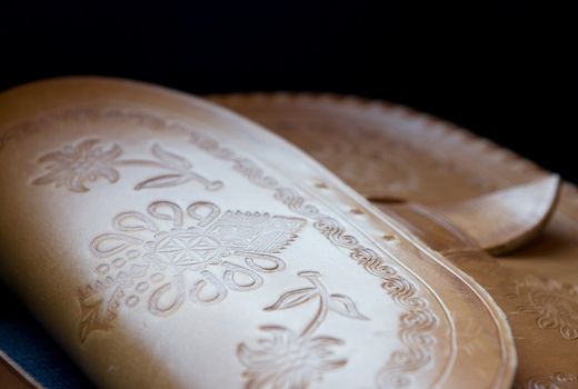 An old leather purse with an embossed pattern