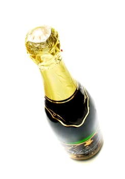 The champagne bottle on a white background. Isolation. Shallow DOF