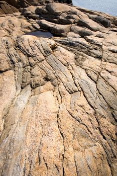 A flowing rock formation near the ocean